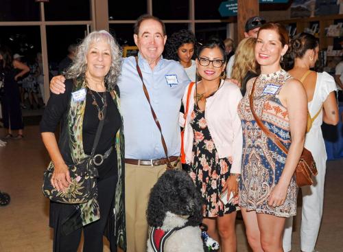 Friends of Brain Injury Recovery at the SDBIF Friendraiser with a support dog
