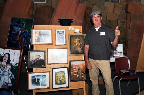 Kurt Rotzinger showing his artwork at the SDBIF Friendraiser